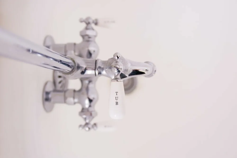 Chrome shower valve with hot and cold handles