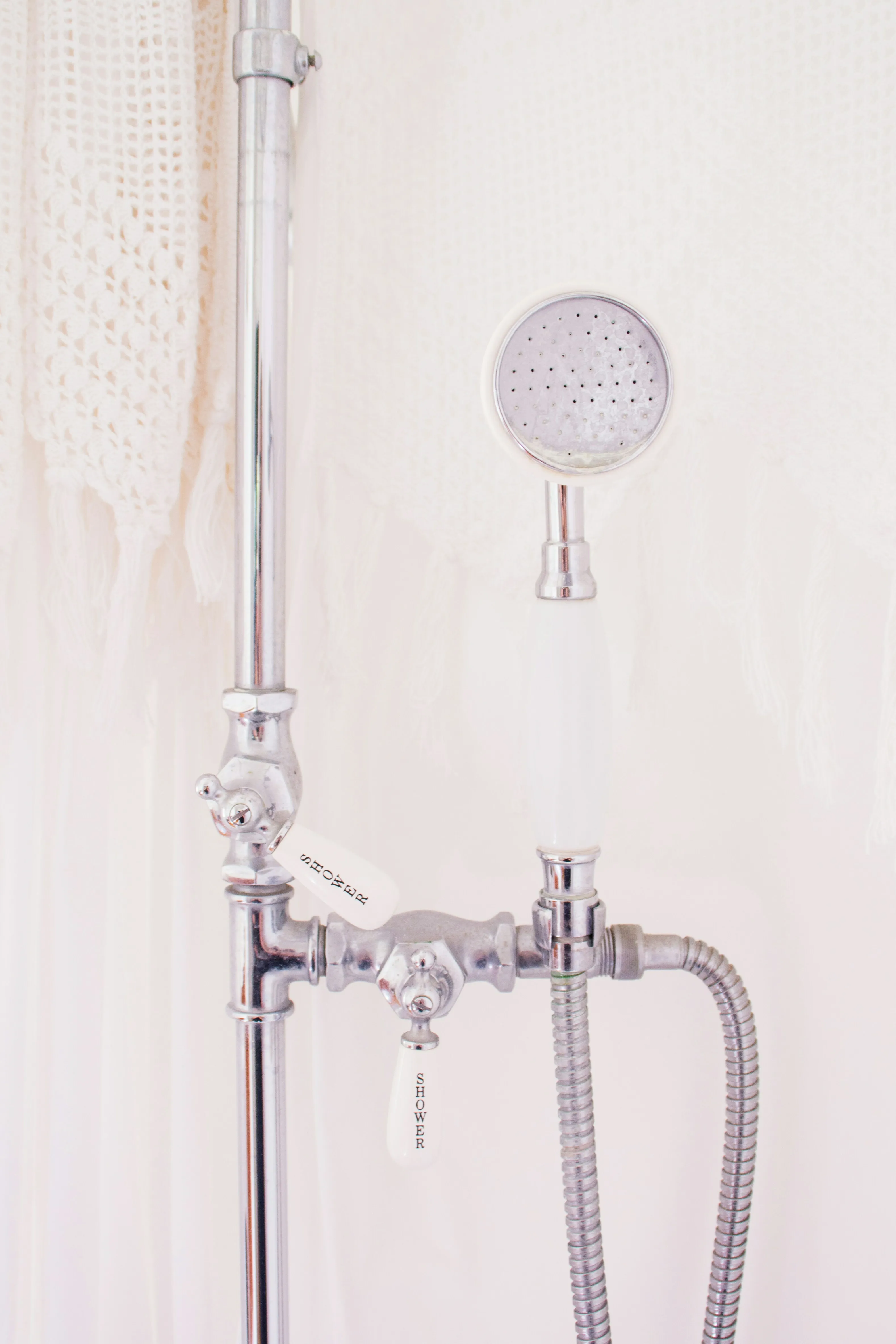 Wall-mounted shower head on a slide bar